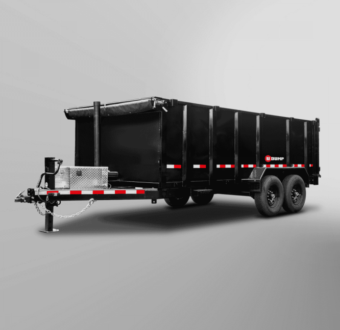 Pro-Heavy Low-Profile Dump Trailer featuring dual axles, red and white reflective stripes, and a front hitch is set against a plain gray background.